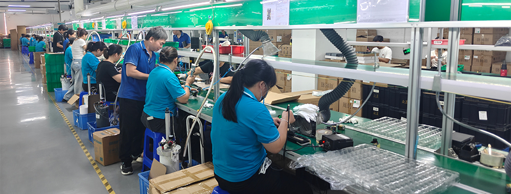 Smartphones Charger Factory - Quality inspectors check the quality during charger production
