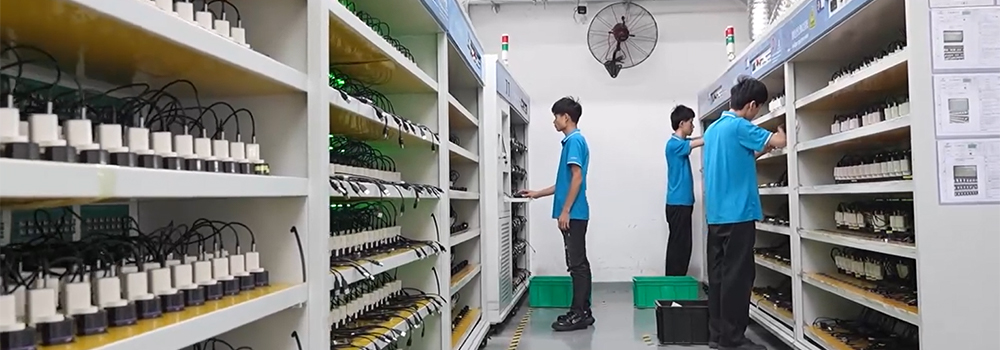 Inspect and examine the phone charger during the aging test